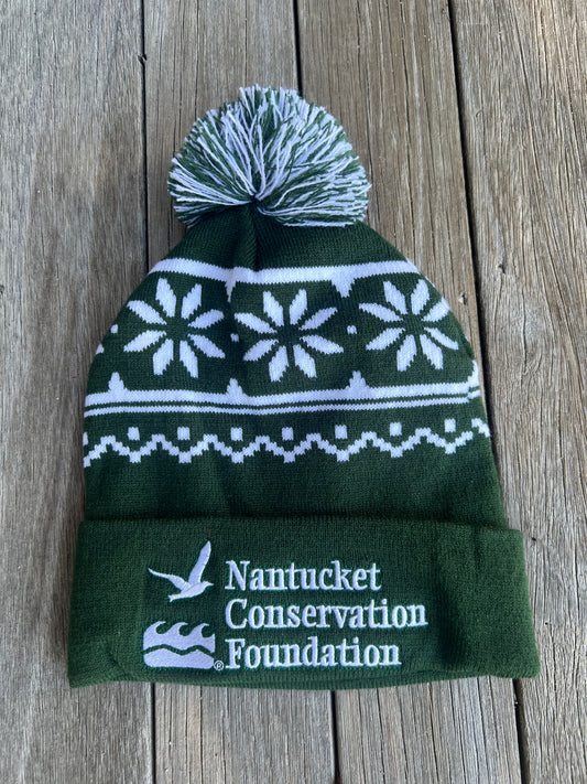 WInter Hat in Green with Snowflakes and Nantucket Conservation Foundation Written on Brim