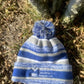 Winter Hat with insulated layer and blue/gray Stripes and Pom-Pom