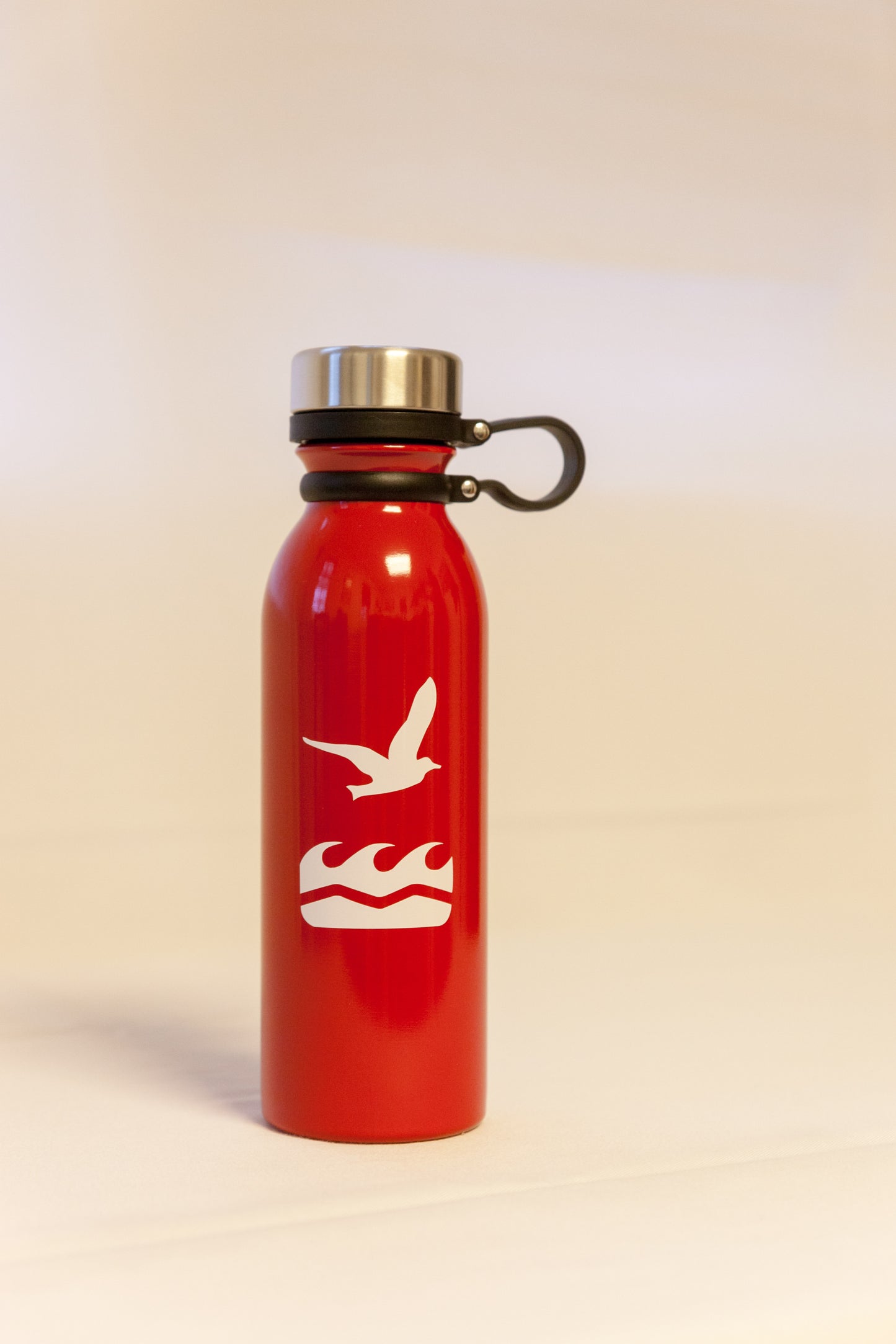 Water Bottle in Red (20 oz) with NCF logo.