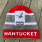 Winter Hat in Red with Gray/White multi-stripes, large NCF logo, and Nantucket written on the brim.