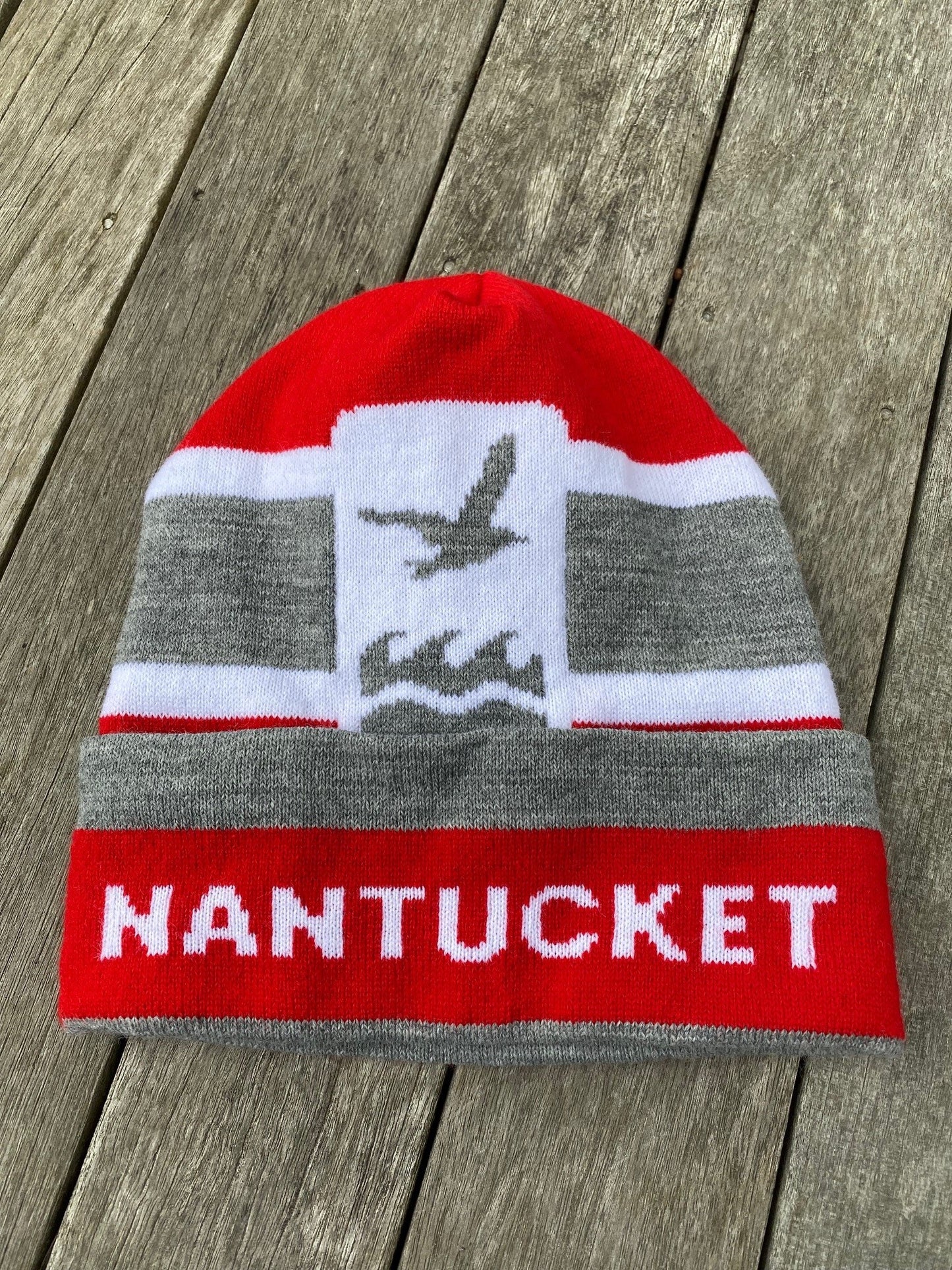 Winter Hat in Red with Gray/White multi-stripes, large NCF logo, and Nantucket written on the brim.